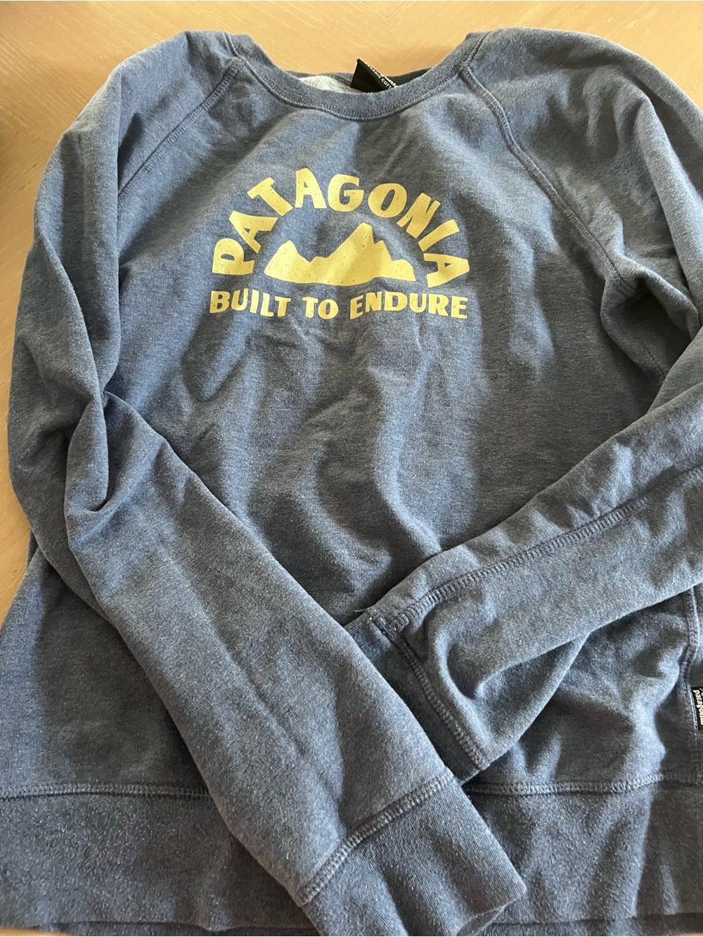 Patagonia women's Navy Crewneck Sweatshirt with Yellow Logo